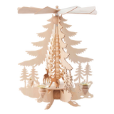 Hand-carved wooden candle pyramid with deer and trees, traditional Erzgebirge design.