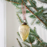 3 inch gold pressed glass pinecone ornament with a bronze cap and ribbon hanger, another view