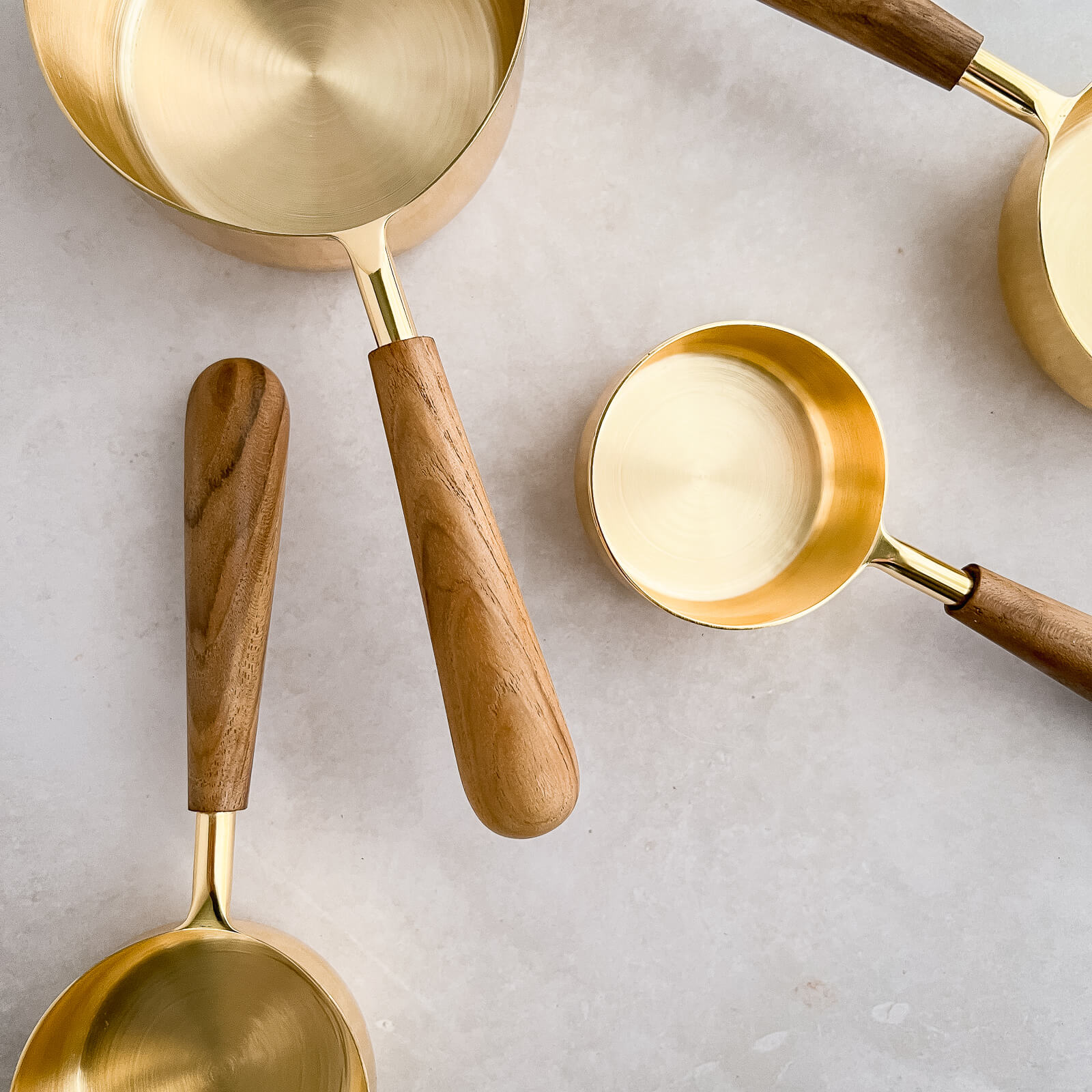 8pc Hand Crafted Measuring Set Gold & Teakwood Measuring Cups | Handcrafted Kitchenware | Faire Living