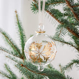 Hand-blown clear glass bauble painted with gold snowflakes, another view